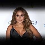 What nationality is Adrienne Bailon?